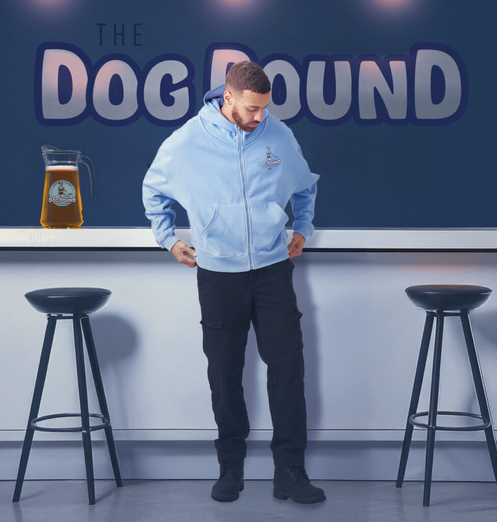 Man Wearing A Sky Blue Dog Pound Hoodie at The Dog Pound